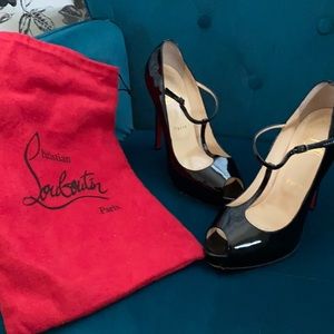 Christian Louboutin black patent leather pumps